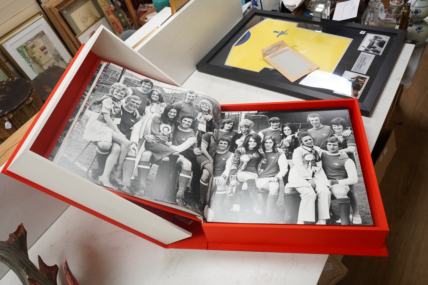 An Arsenal Opus, Icons Edition #47 in a series of 500, signed by Arsene Wenger, Tony Adams, Patrick Vieira, Dennis Bergkamp, Charlie George, Bob Wilson, Frank Mclintock, Thierry Henry, George Graham, Liam Brady, David Se